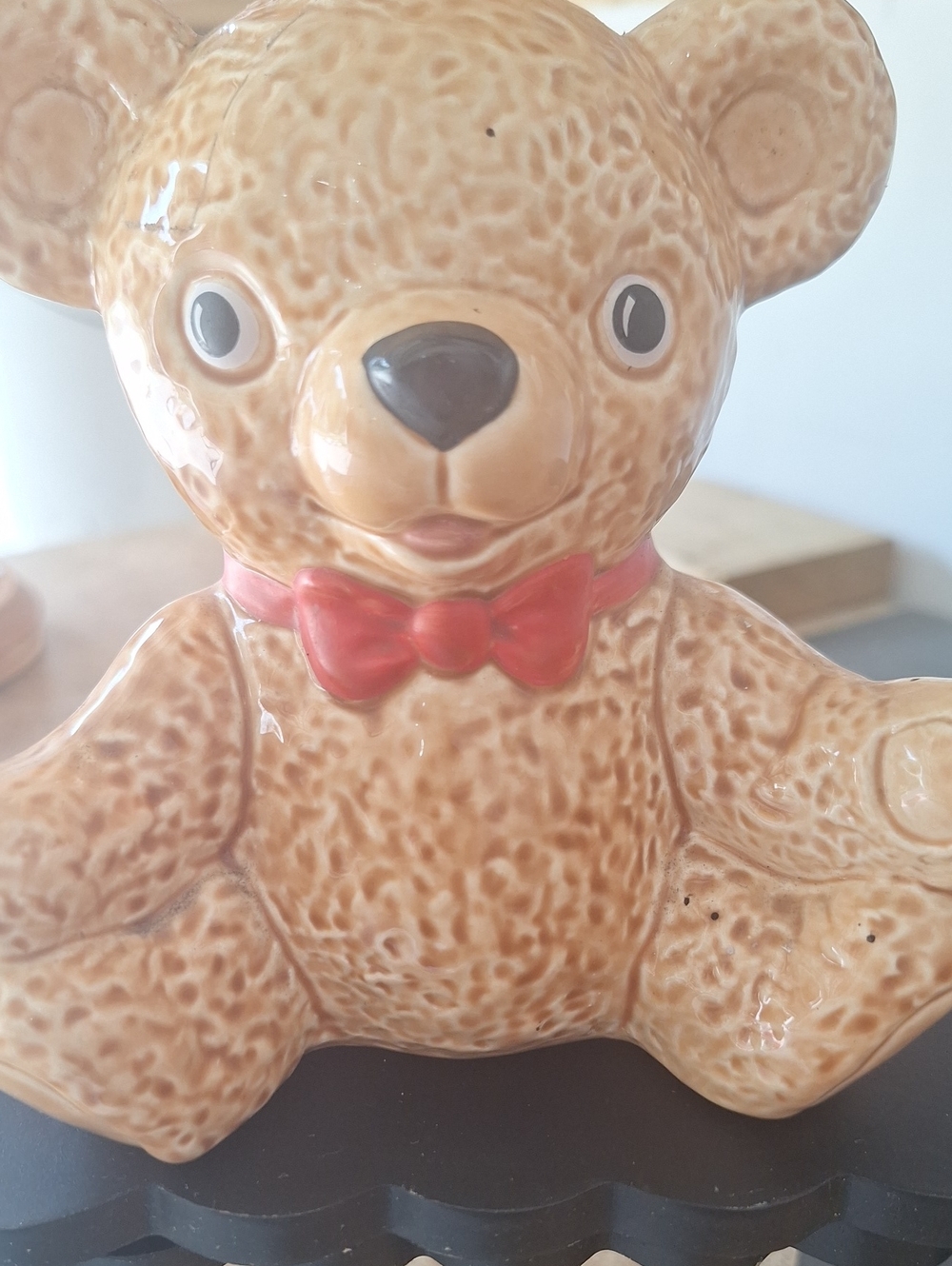 Ceramic Teddy Bear Figurine with Red Bow